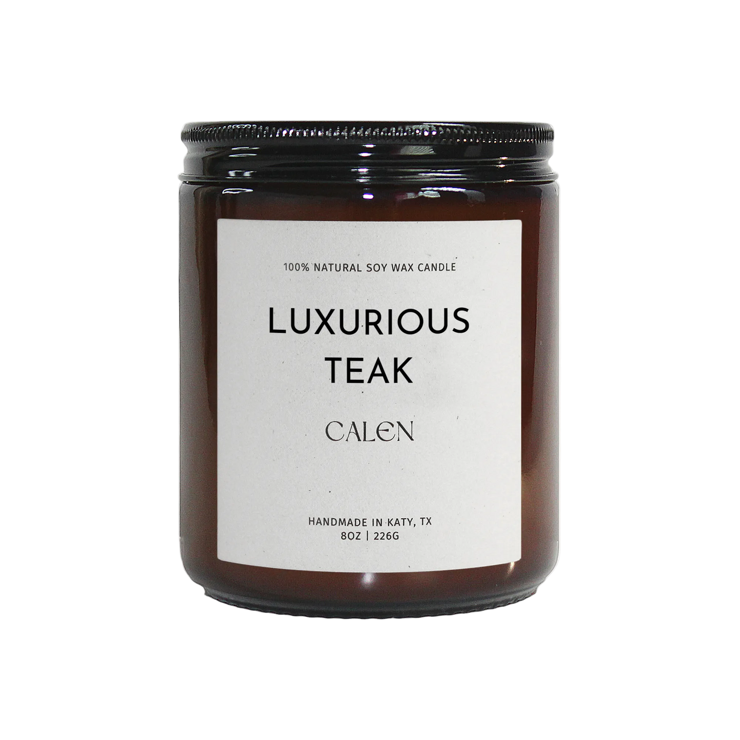 Candle labeled 'Luxurious Teak' by 'Calen' on a white background