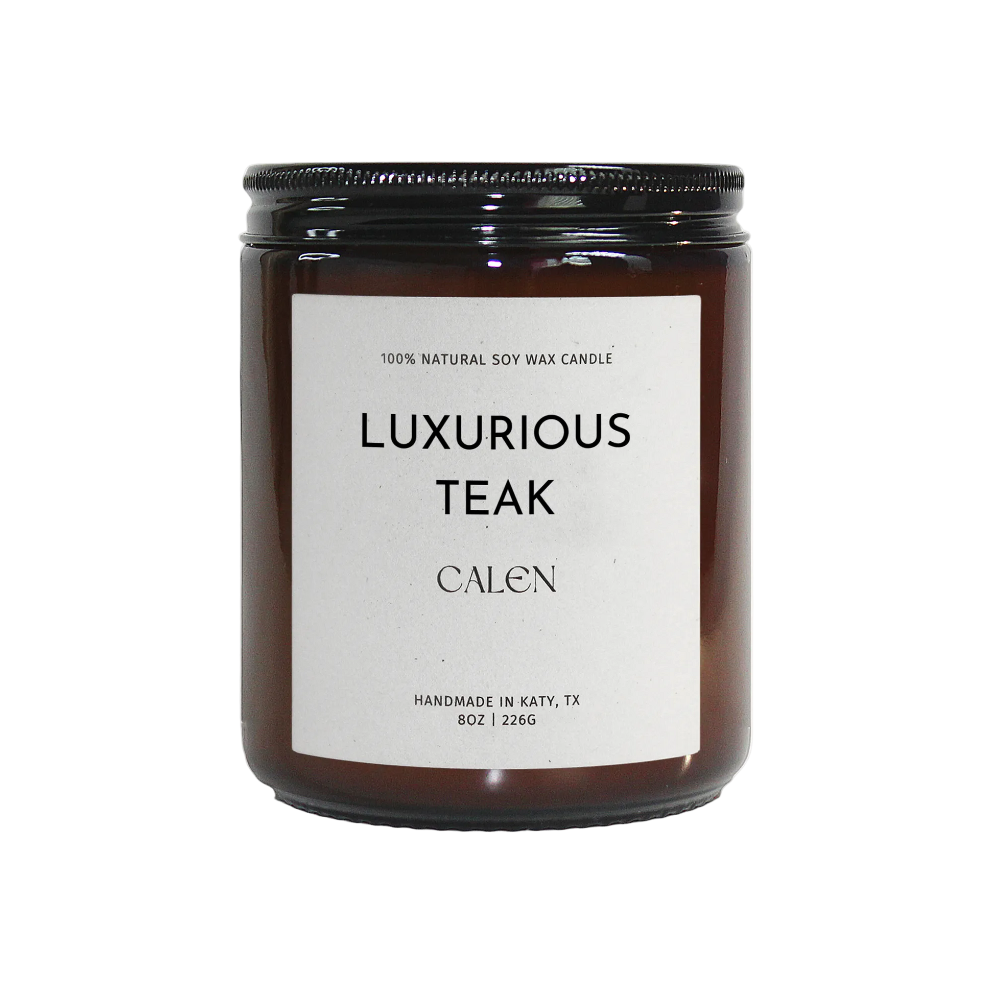 Candle labeled 'Luxurious Teak' by 'Calen' on a white background