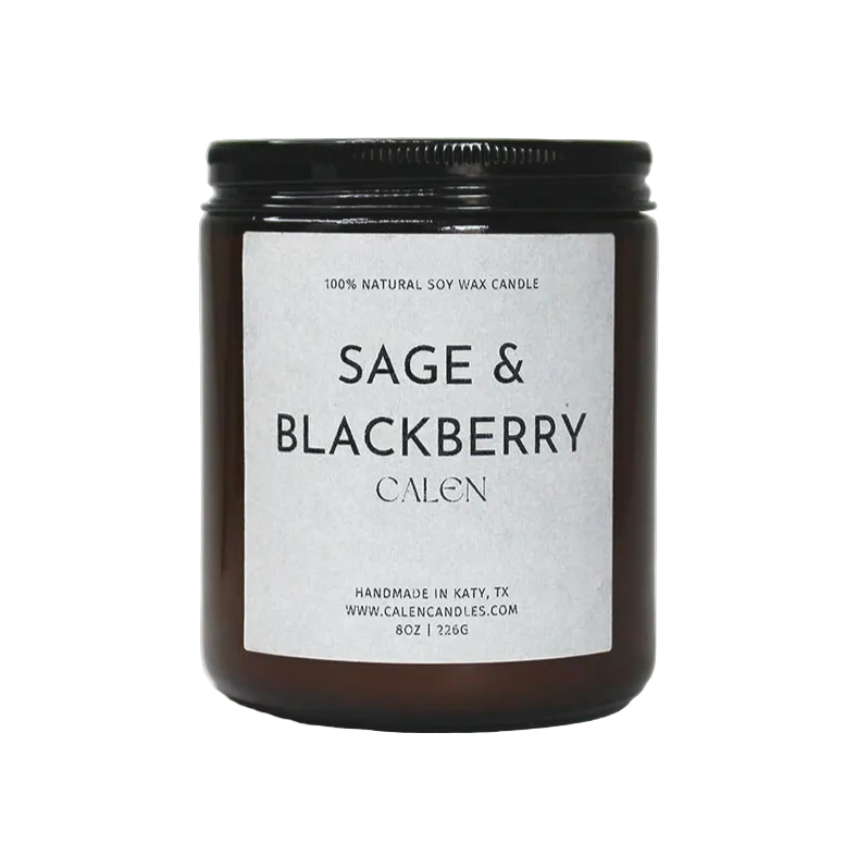 Candle jar labeled 'Sage & Blackberry' on a white background