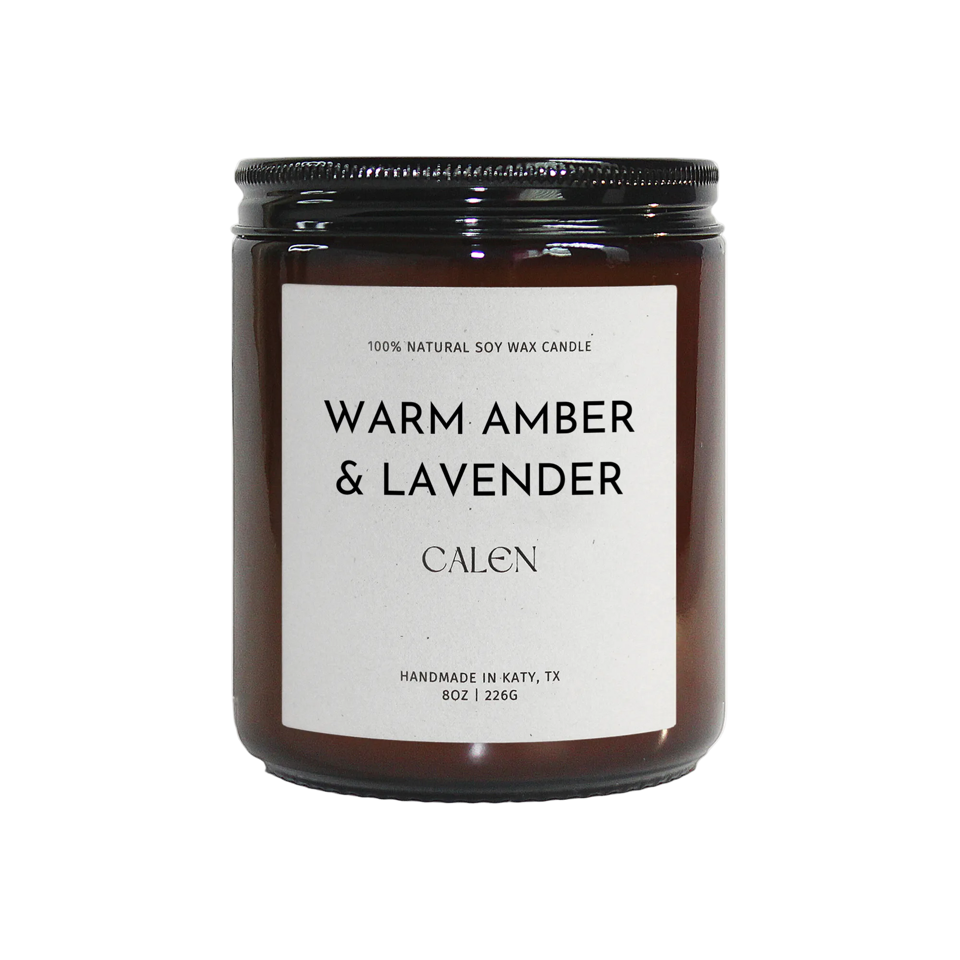Candle with 'Warm Amber & Lavender' label on a white background
